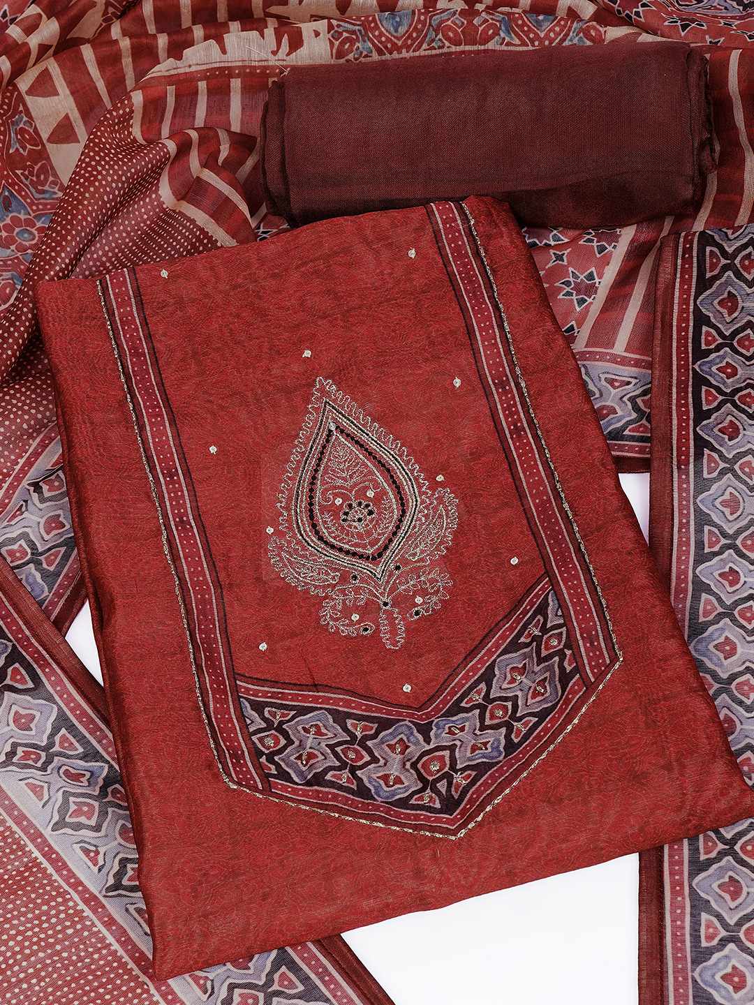 Unstitched 3-Piece Art Silk Suit Set with Embroidered Yoke, Printed Dupatta.(Rust)