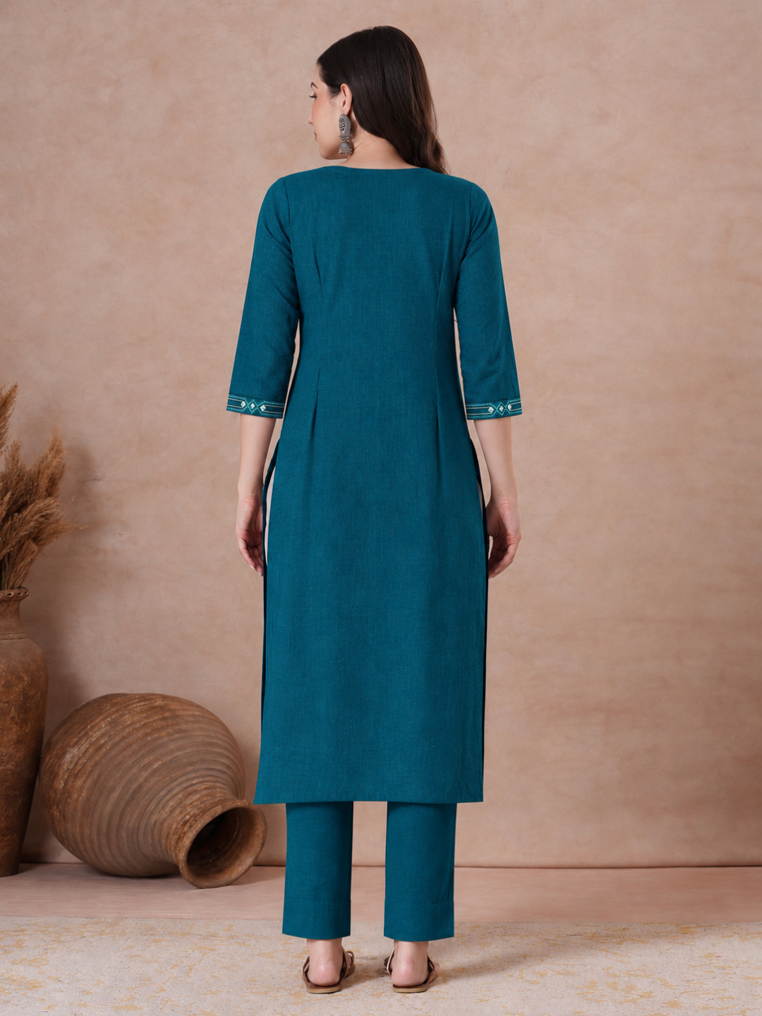 Straight Fit Cotton Kurta with Geometric Machine Embroidery on V-Neck and Sleeves.