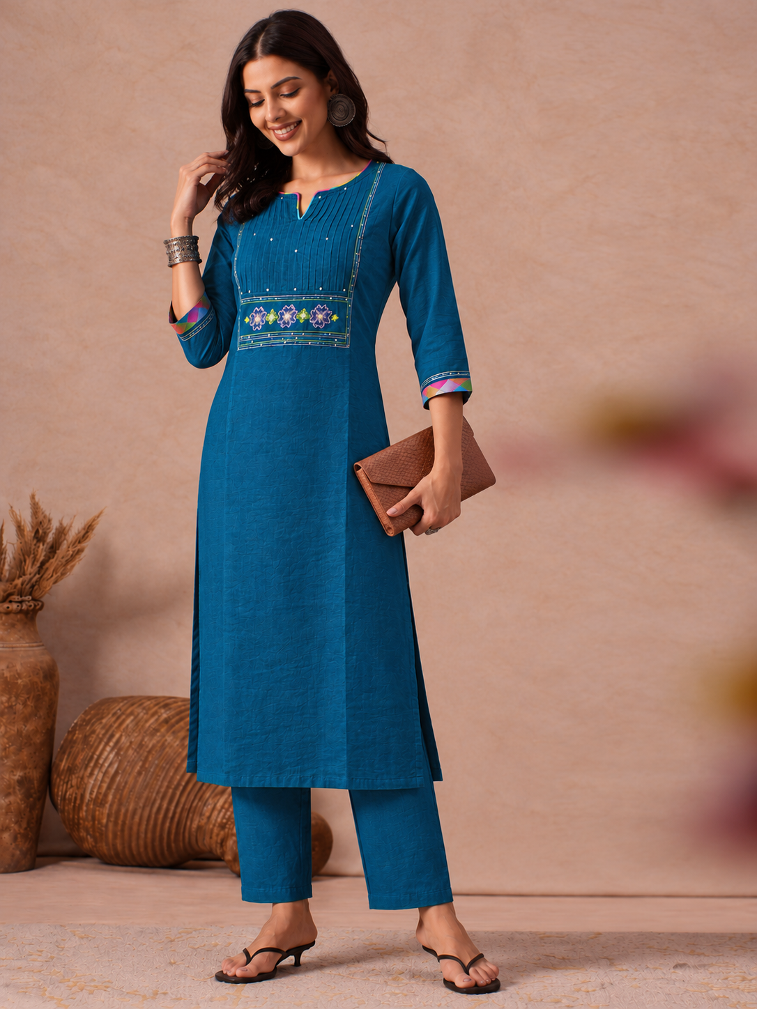 Straight Fit Cotton Kurta Set with Geometric Embroidery, Sequin Work and Plain Pants.