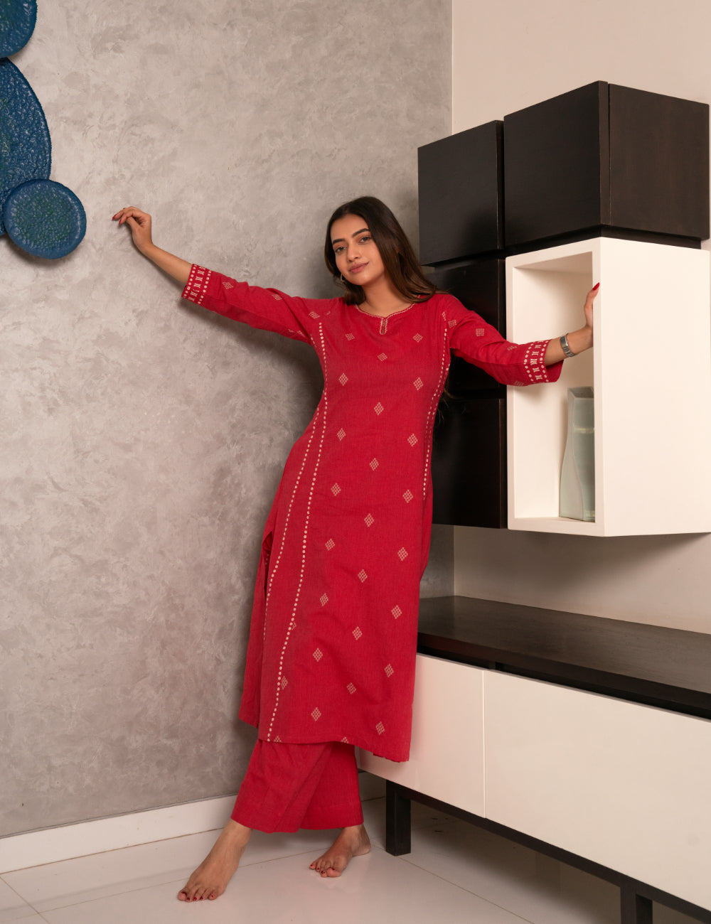 A-Line dobby kurta with block print on the princess Pannel and sleeve cuff along with handwork.