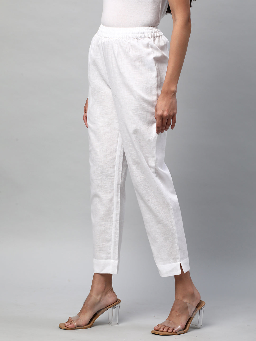 A fully elasticated white ankle length cotton linen pant