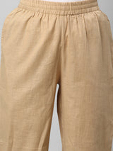 A fully elasticated beige ankle length cotton linen pant
