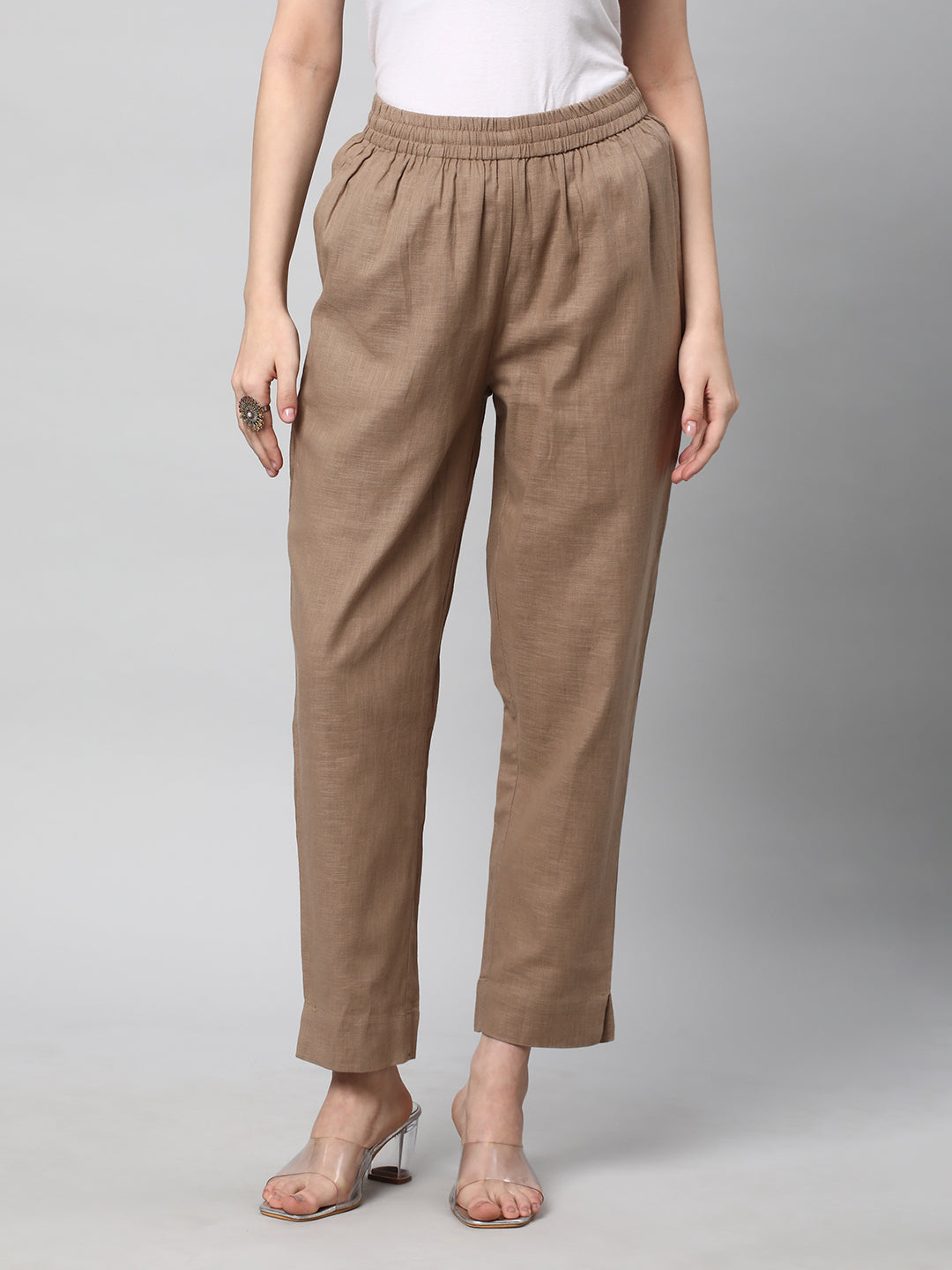 A fully elasticated brown ankle length cotton linen pant