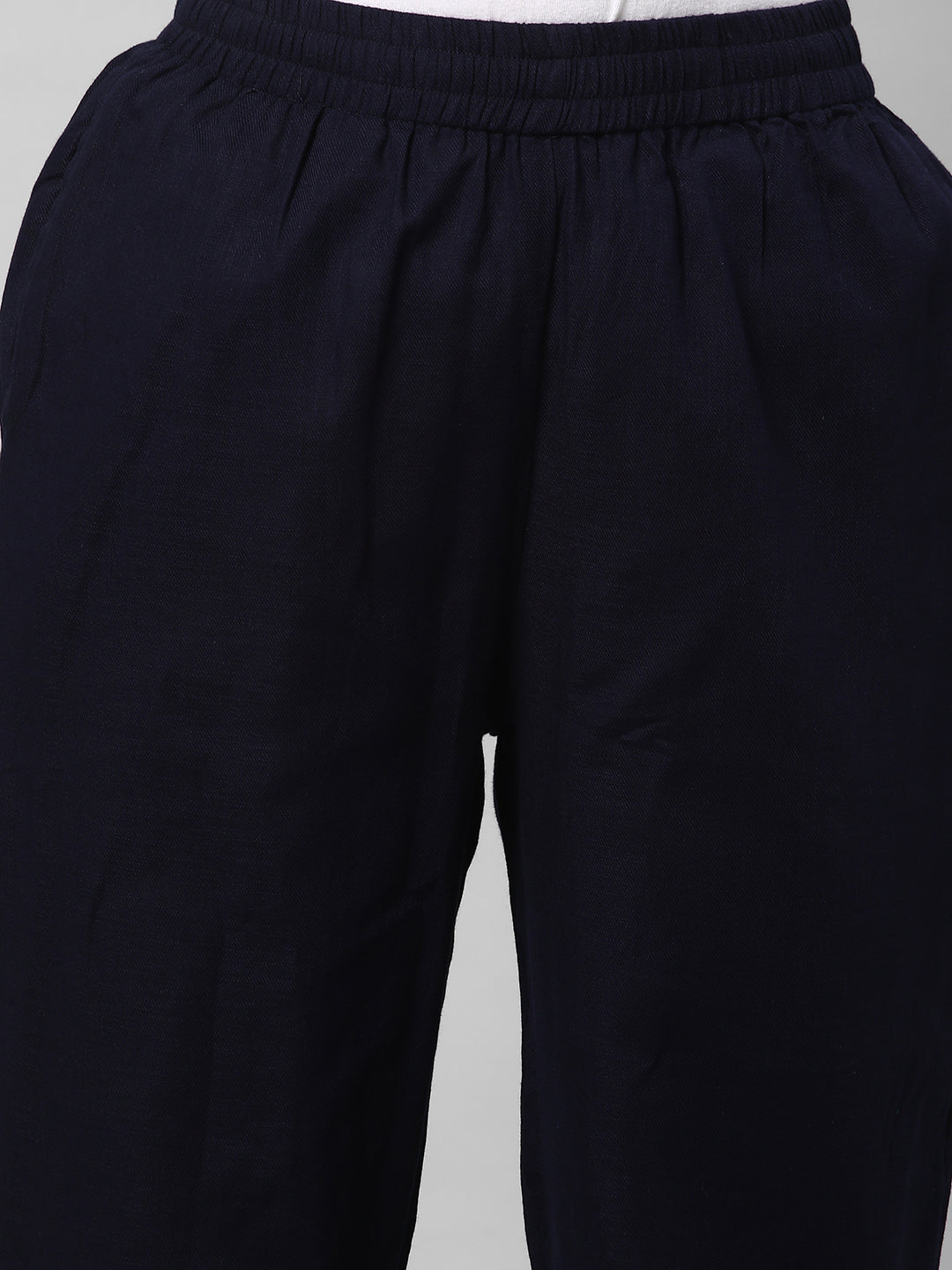 A fully elasticated Navy ankle length cotton linen pant