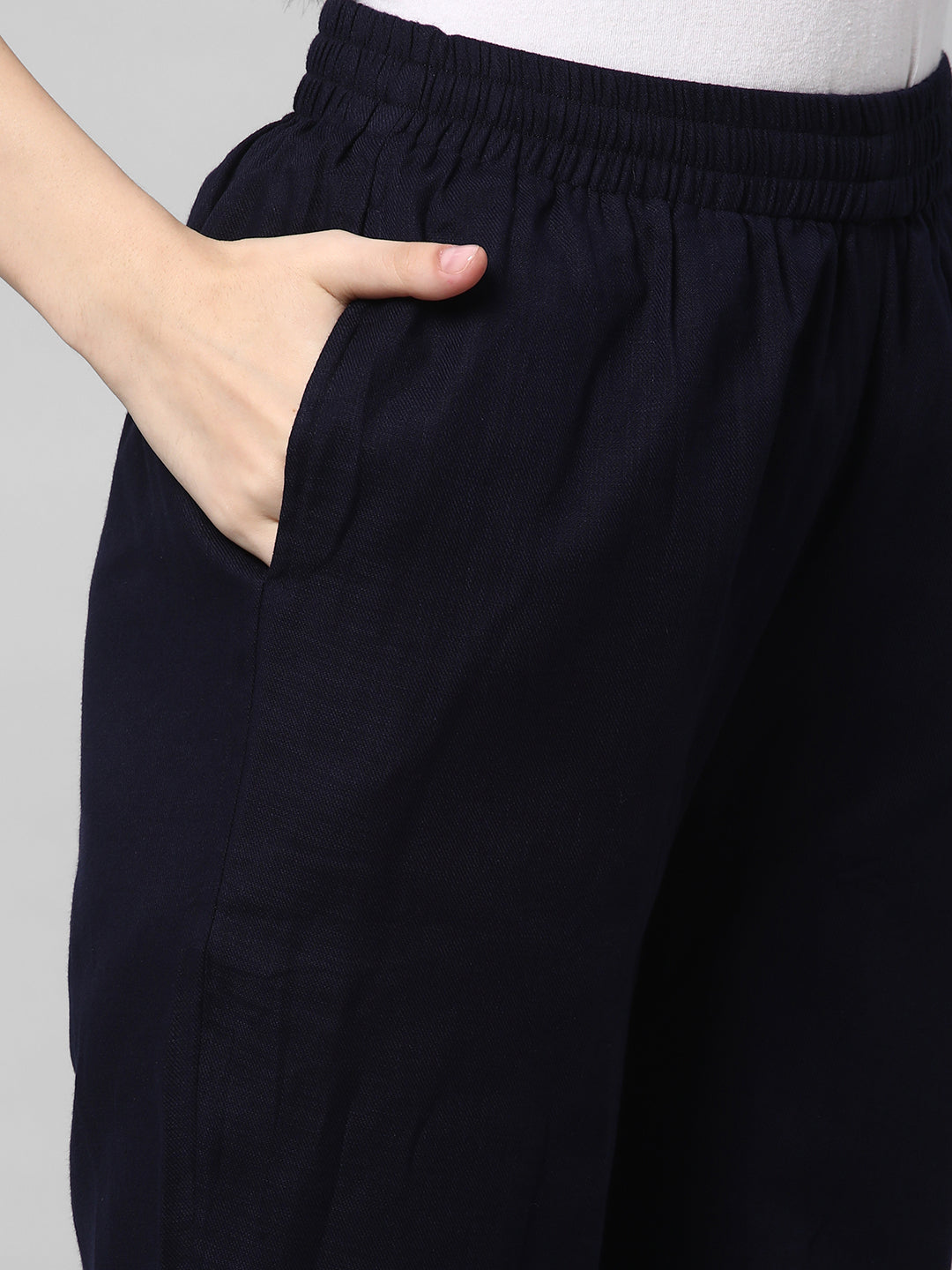 A fully elasticated Navy ankle length cotton linen pant