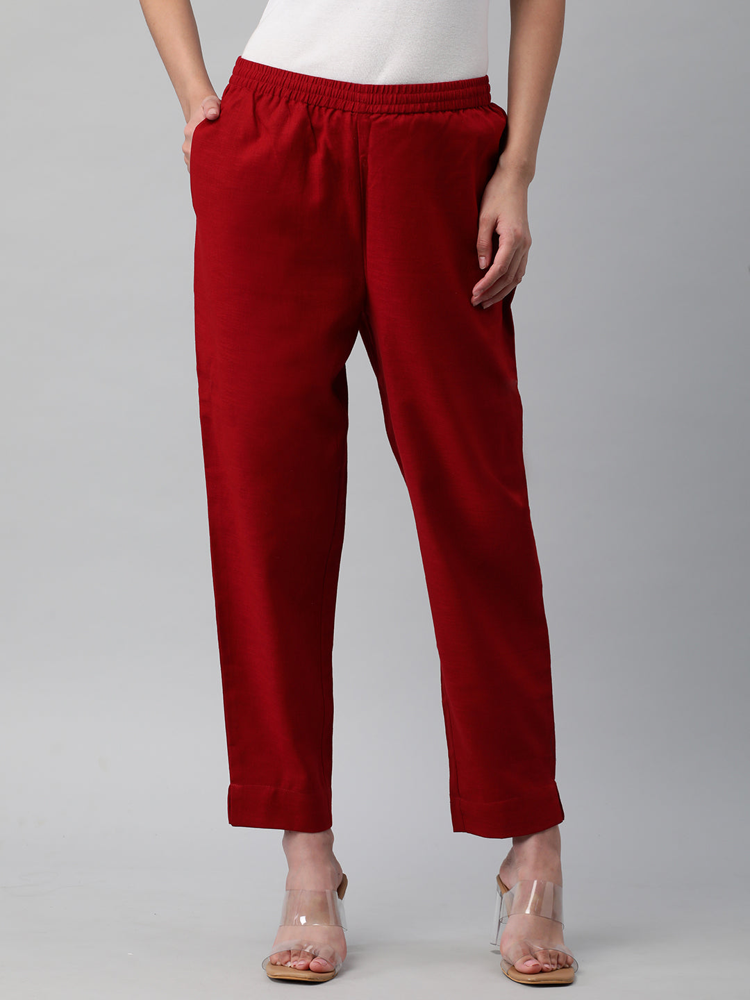 A fully elasticated maroon ankle length cotton linen pant