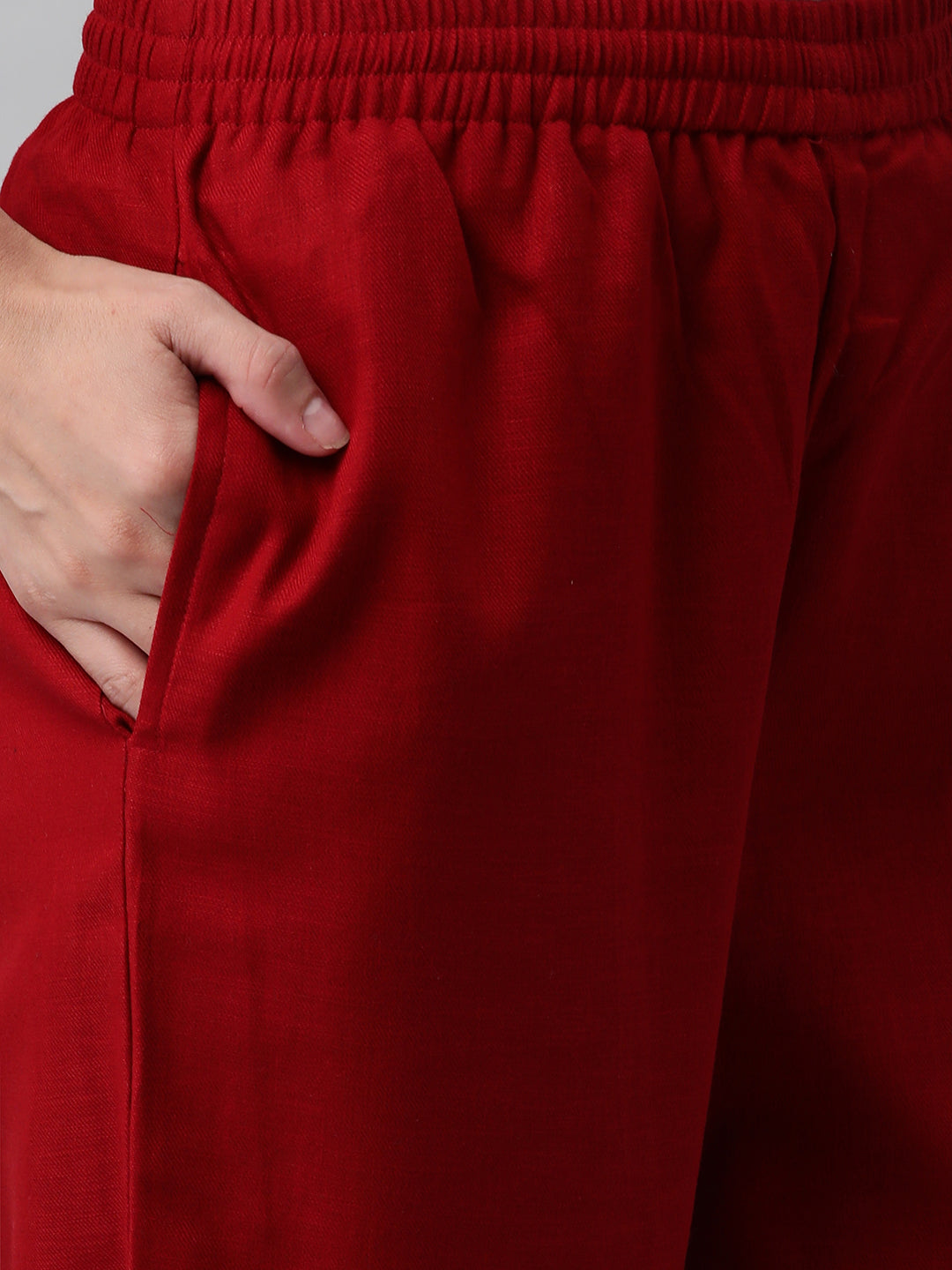 A fully elasticated maroon ankle length cotton linen pant