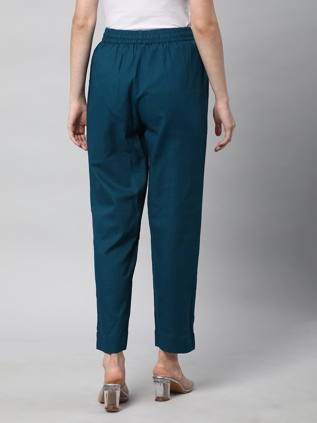 A fully elasticated teal ankle length cotton linen pant