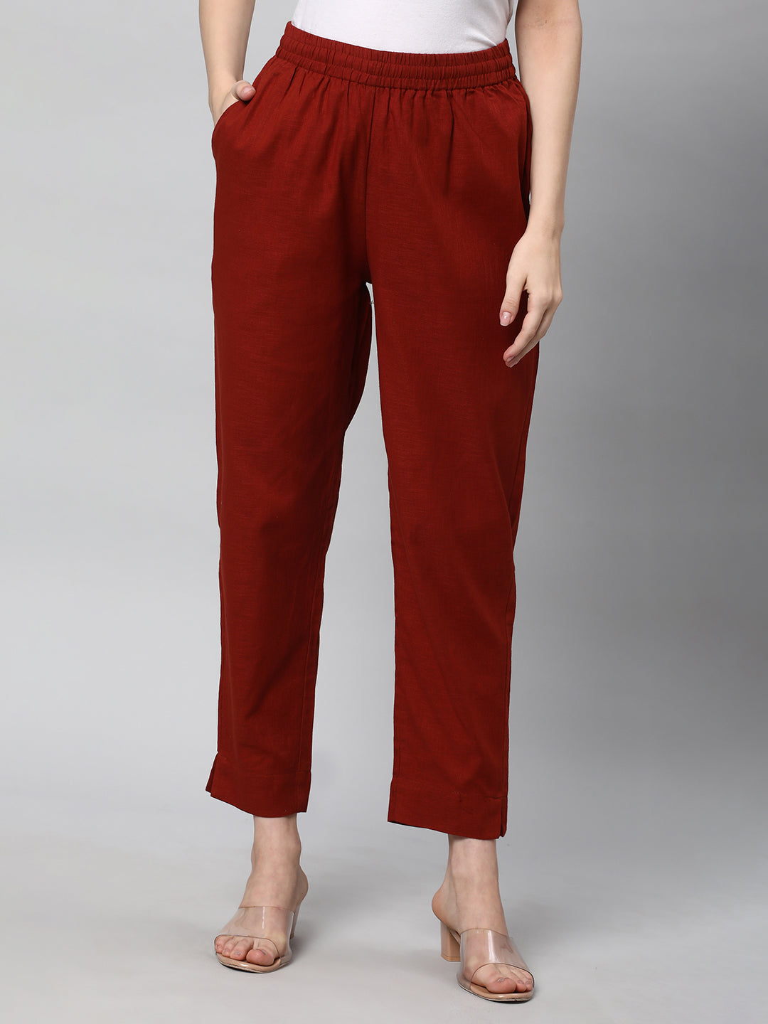 A fully elasticated rust ankle length cotton linen pant