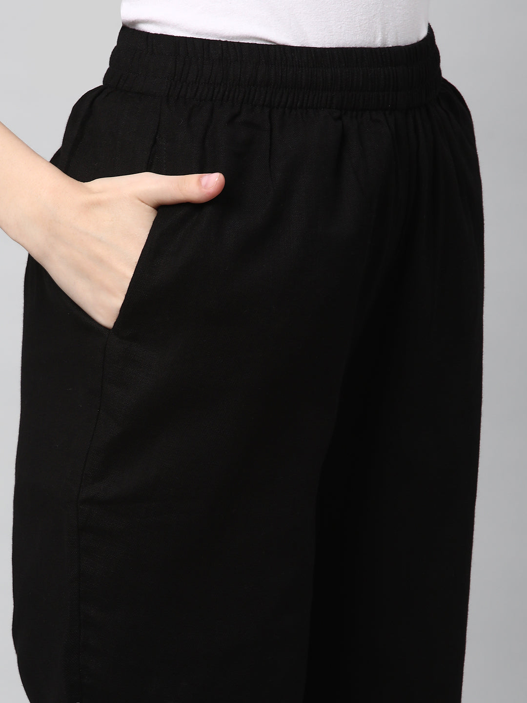 A fully elasticated black ankle length cotton linen pant