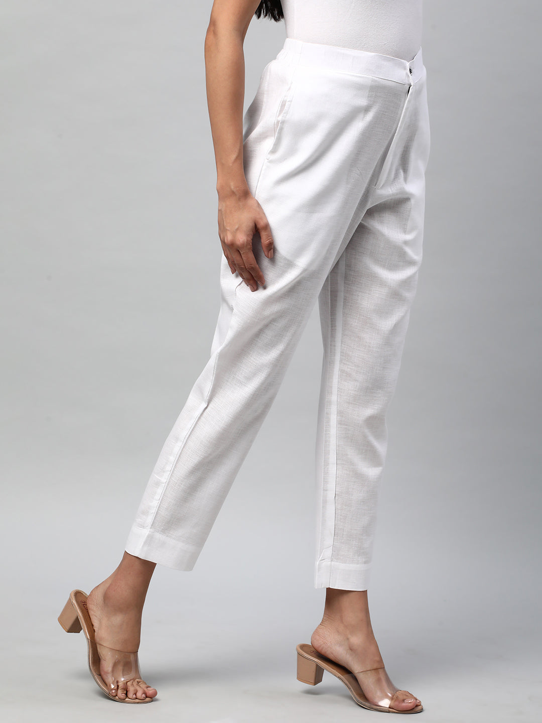 A White ankle length coton linen pant with plain belt in front