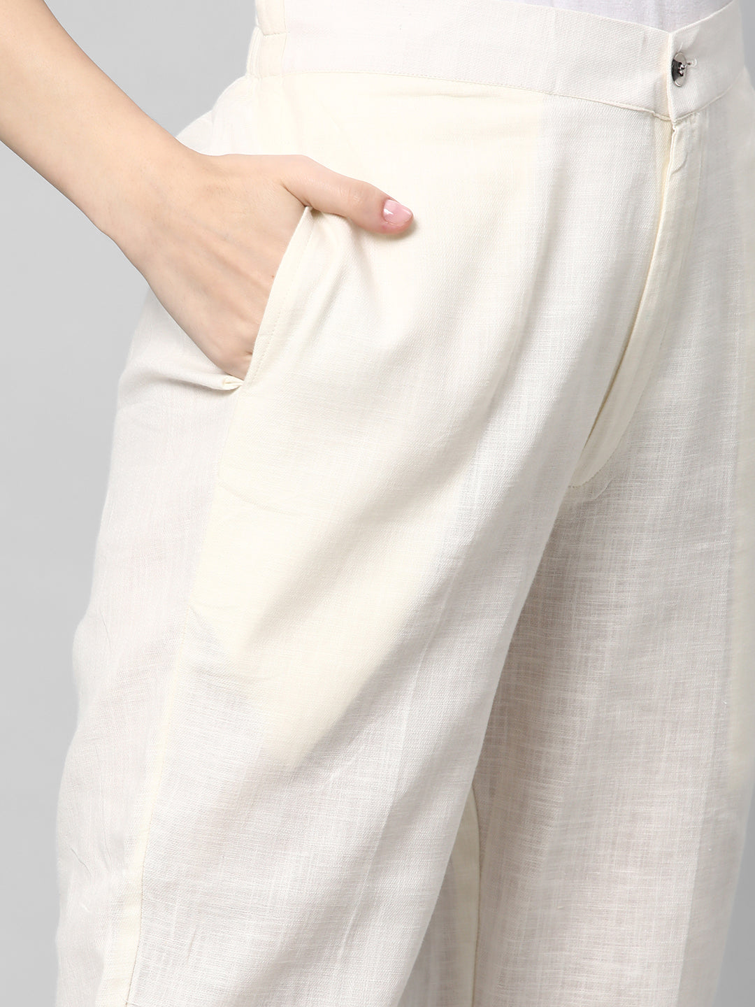 A Off-white ankle length cotton linen pant with plain belt in front