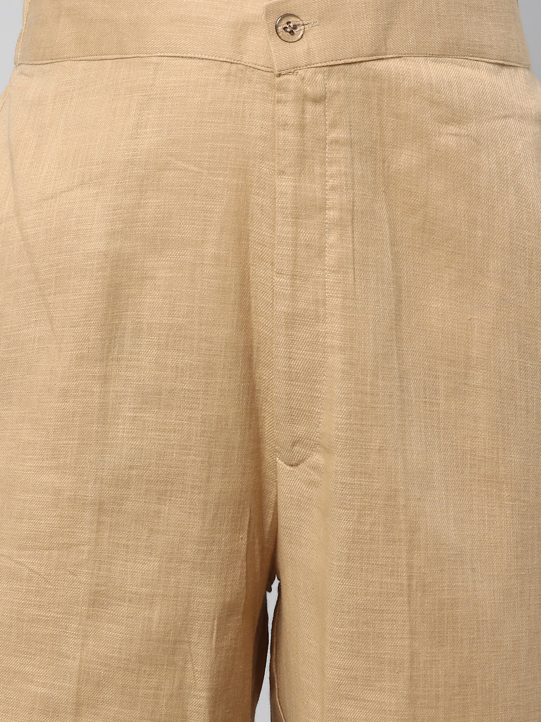 A beige ankle length cotton linen pant with plain belt in front