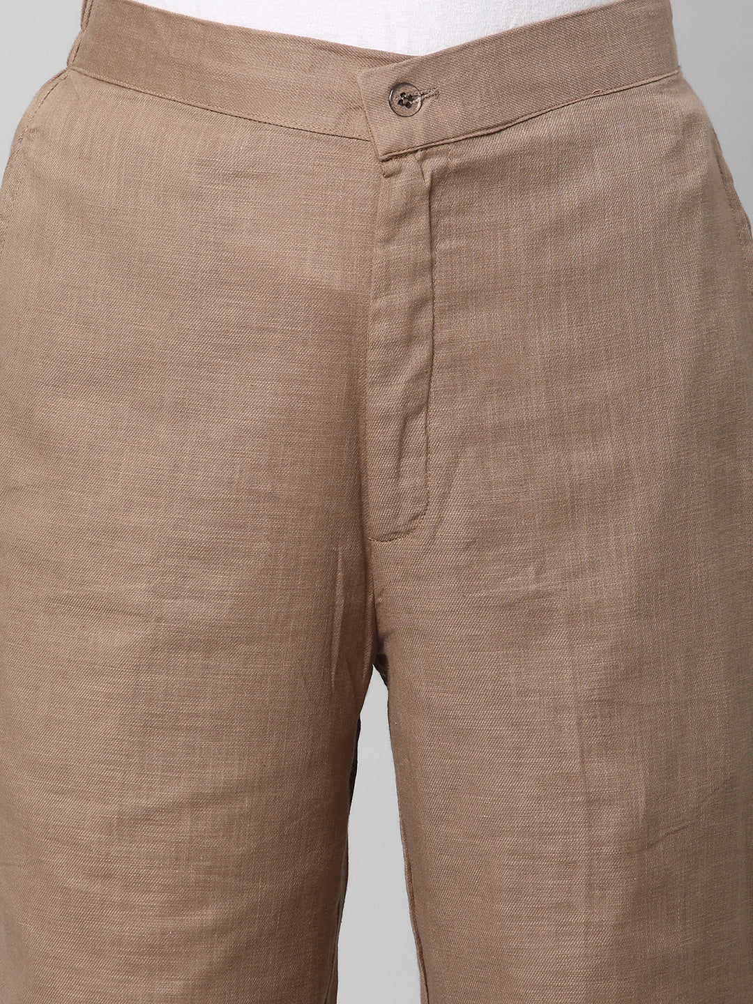 A brown ankle length cotton linen pant with plain belt in front