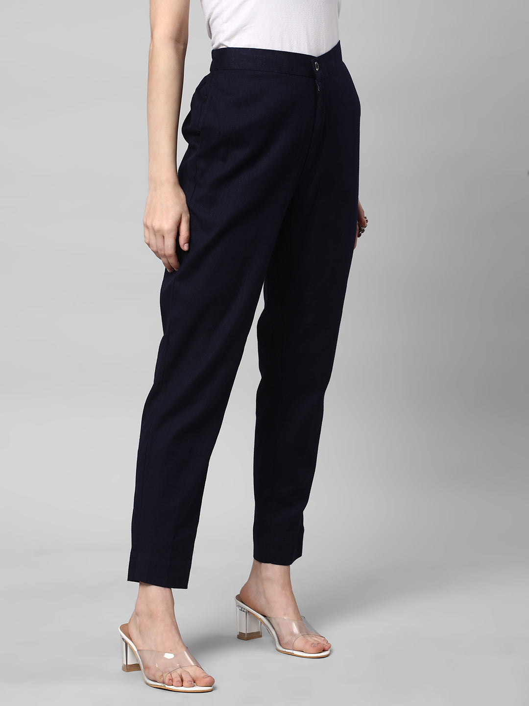 A Navy ankle length cotton linen pant with plain belt in front