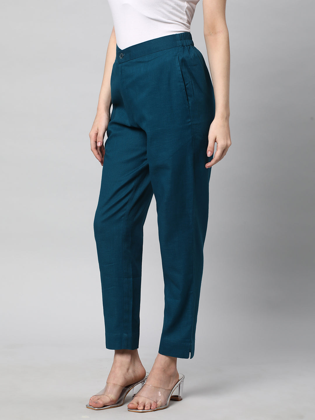 A Teal ankle length cotton linen pant with plain belt in front