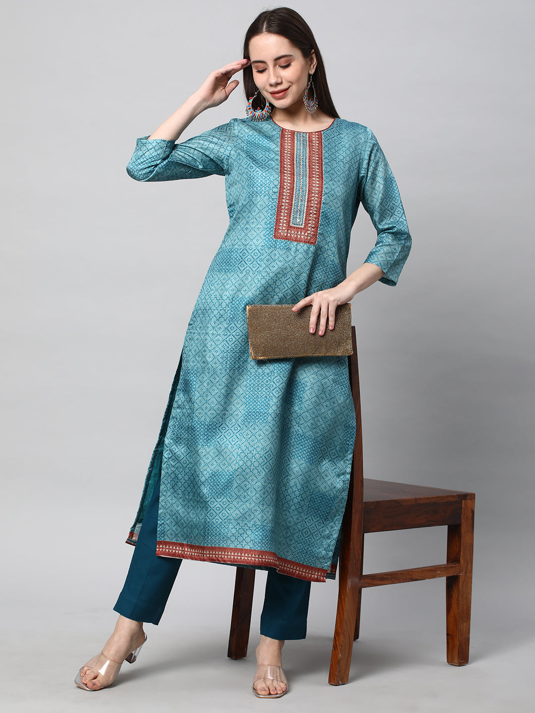 A Teal ankle length cotton linen pant with plain belt in front