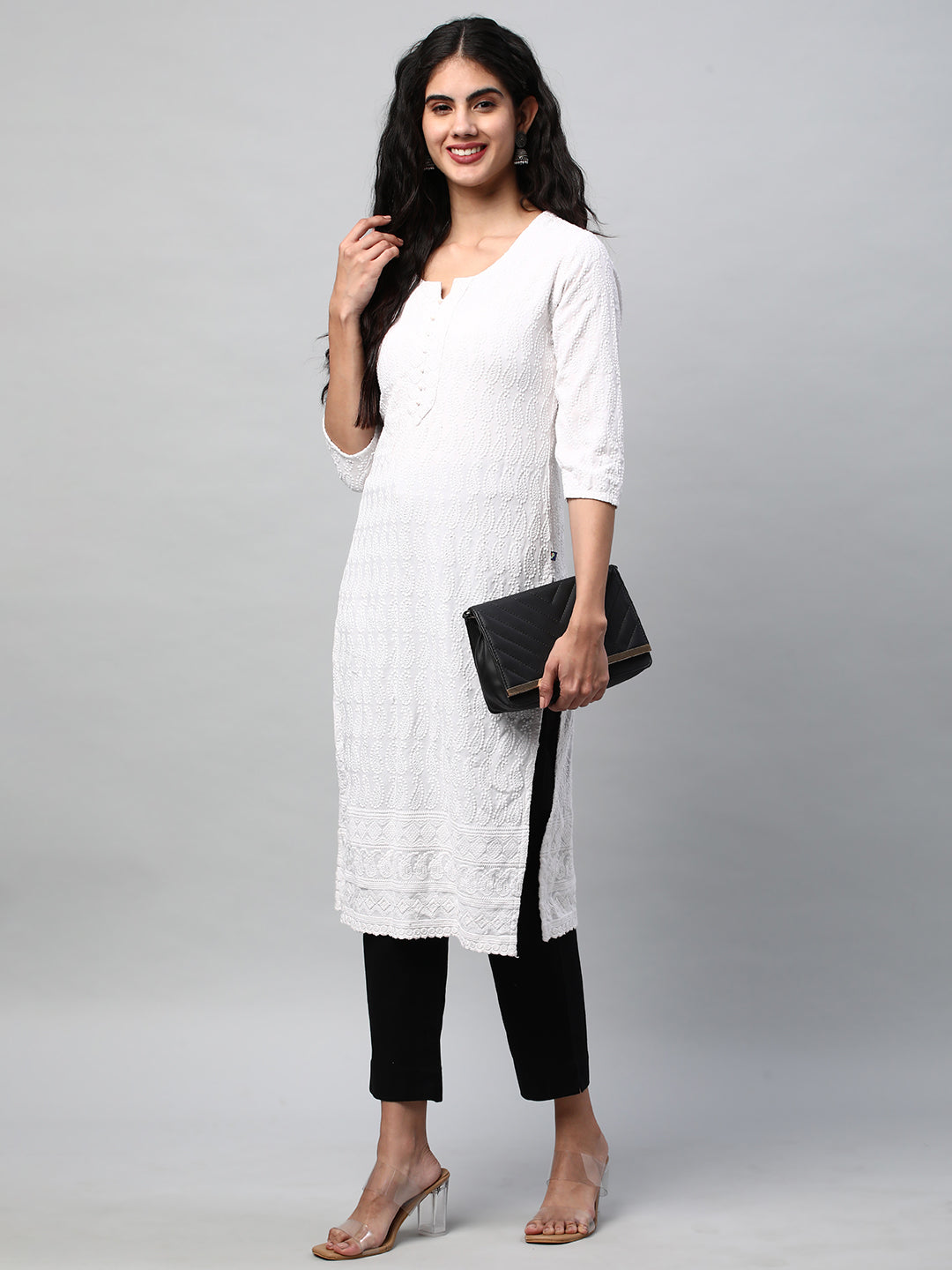 A Black ankle length coton linen pant with plain belt in front