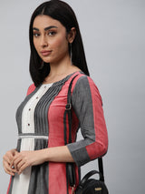 Pleated dress with handwork detailling