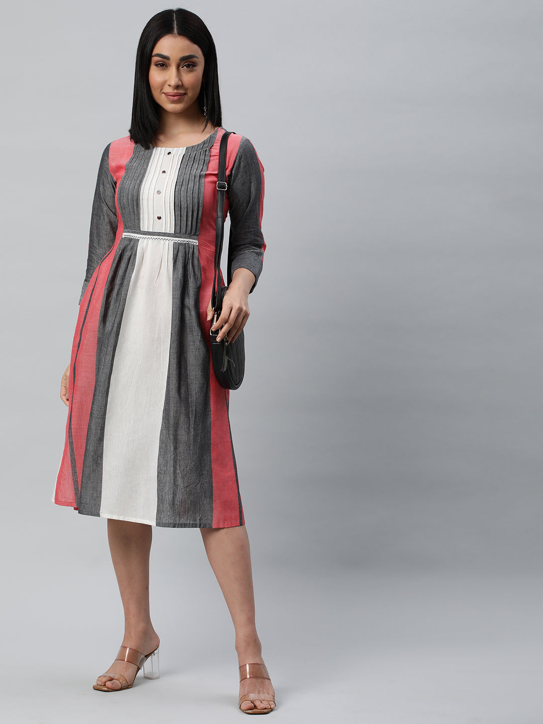 Pleated dress with handwork detailling