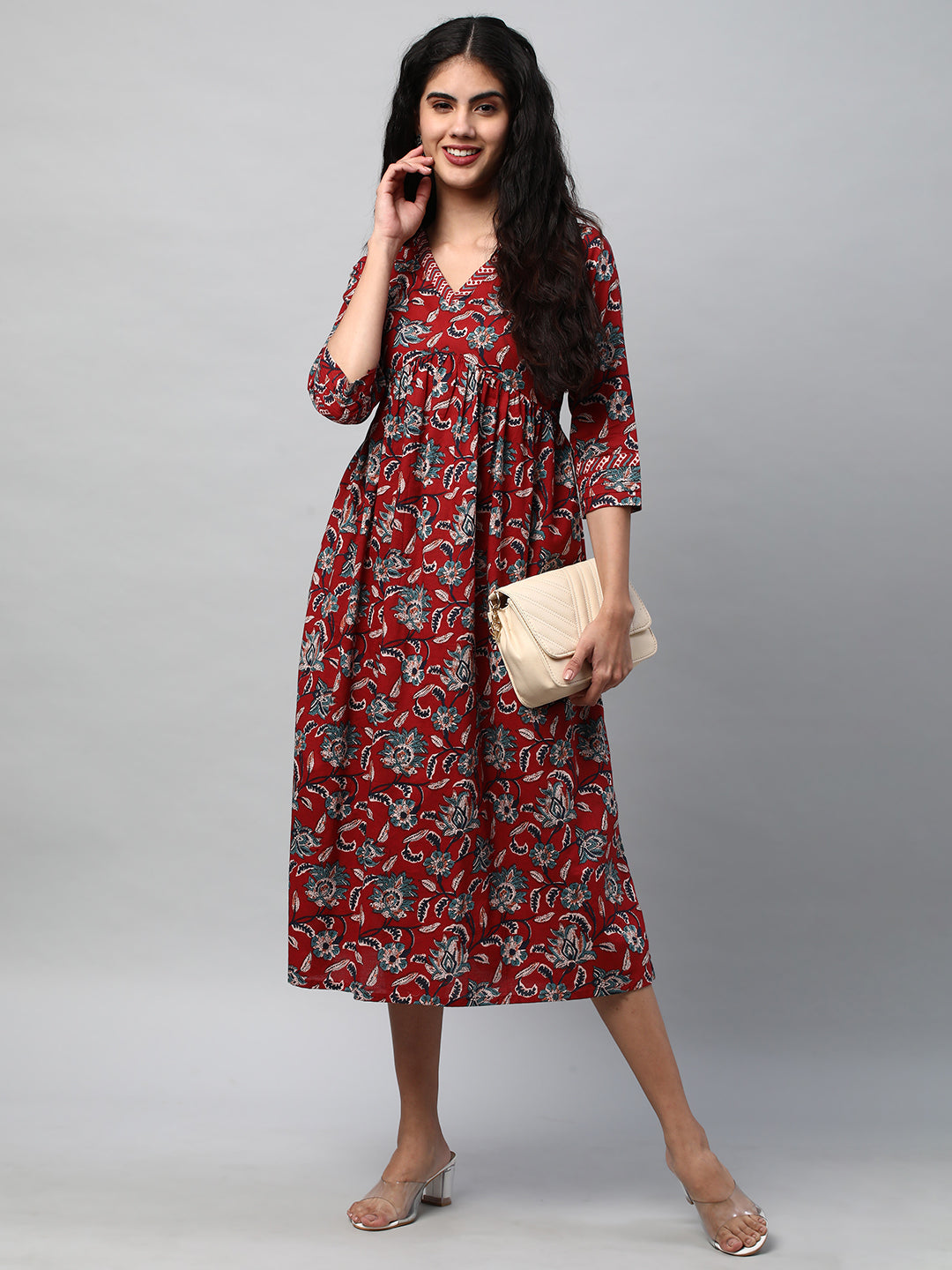 Flared dress with gathering details and side pocket