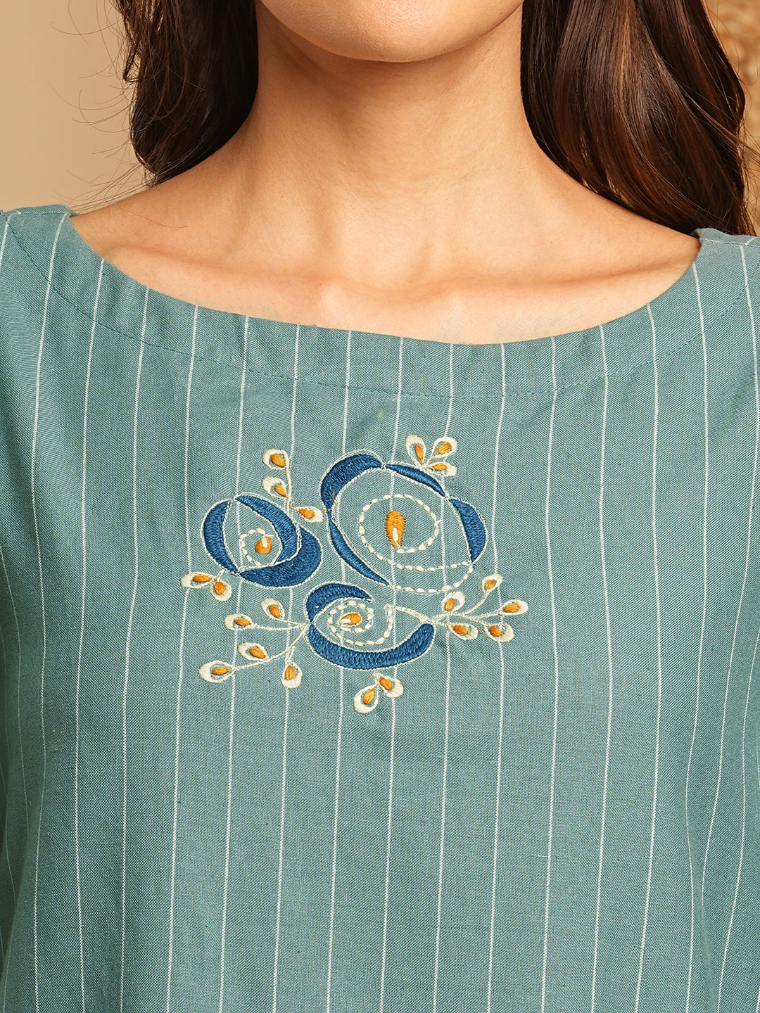 Embroidered A line dress in cotton stripe fabric with button detailing