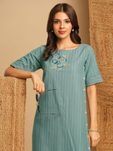 Embroidered A line dress in cotton stripe fabric with button detailing
