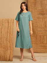 Embroidered A line dress in cotton stripe fabric with button detailing