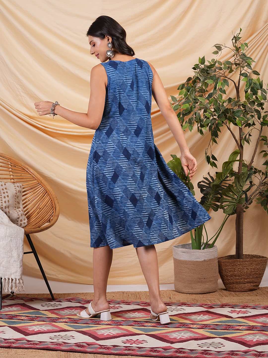 A-Line Pleated sleeveless dress in cotton dhabu print