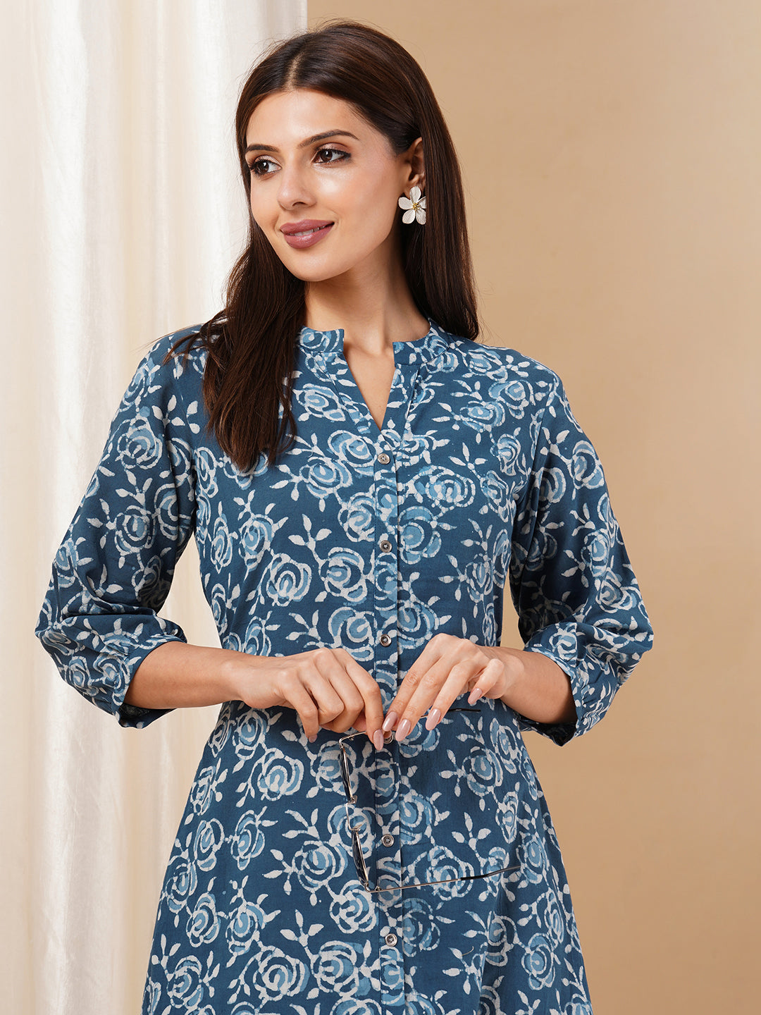 Straight fit and flared bagru printed cotton dress with gathering and pocket details