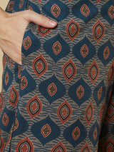 A mustard kurta suit set featuring a mix-match yoke and hand applique