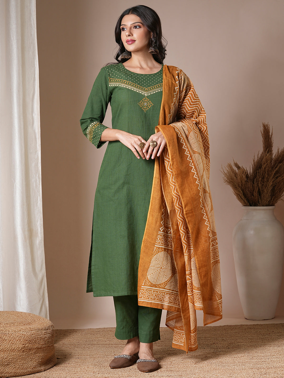 Green straight kurta set with geometrically printed mustard kota dupatta