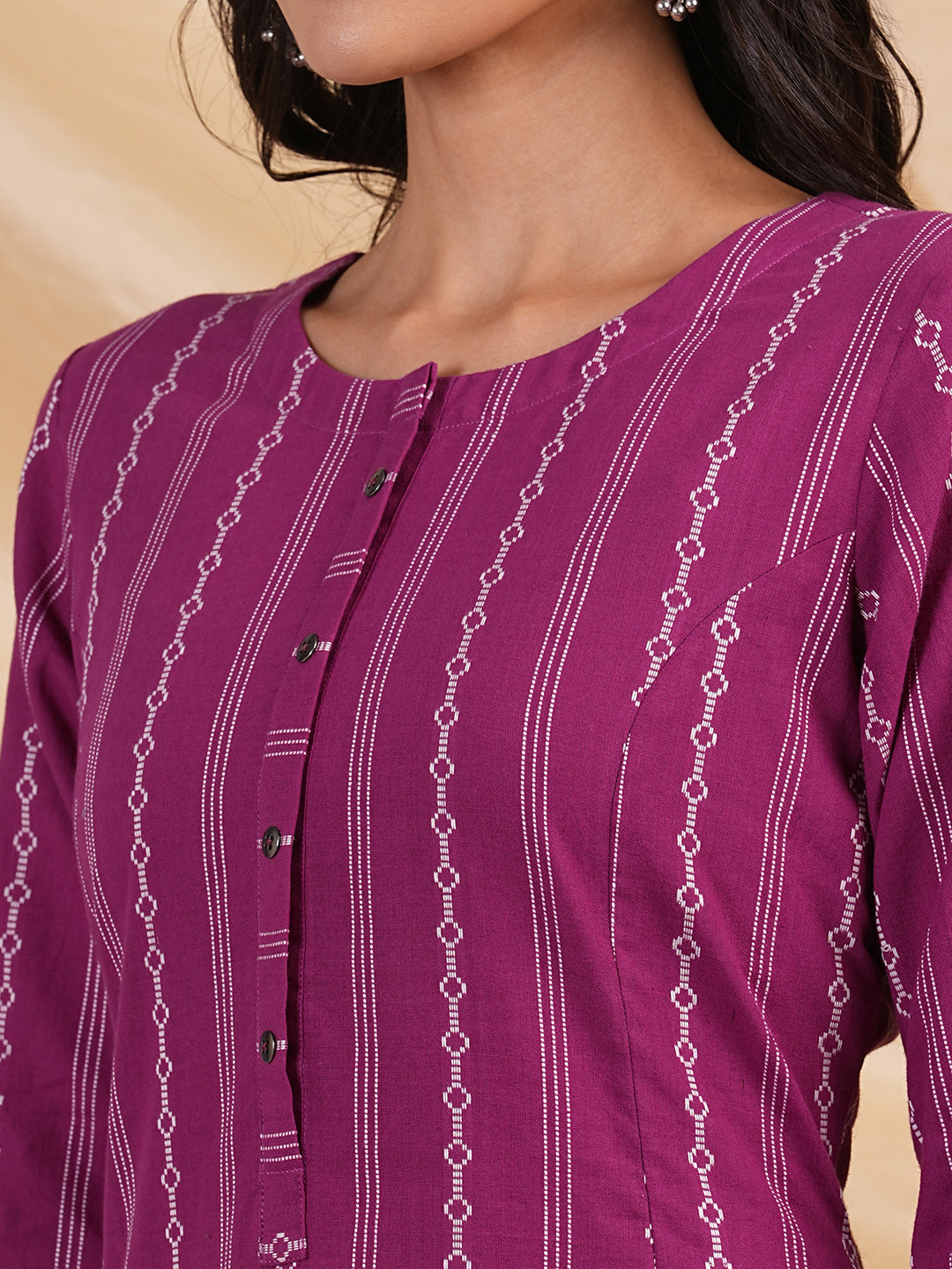 A line woven kurta with a shoulder princess line with a central placket