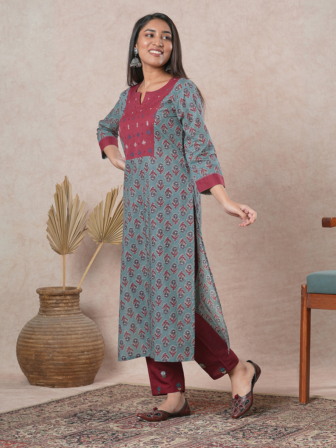 Straight cut printed kurta with a hand embroidered yoke and sleeve details