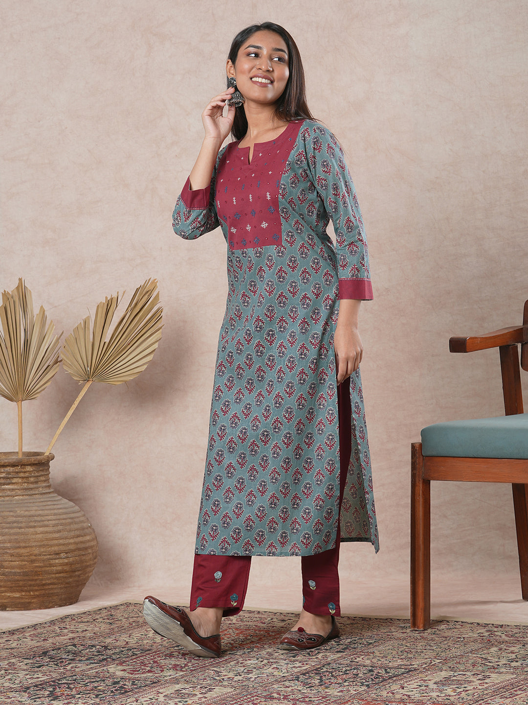 Straight cut printed kurta with a hand embroidered yoke and sleeve details