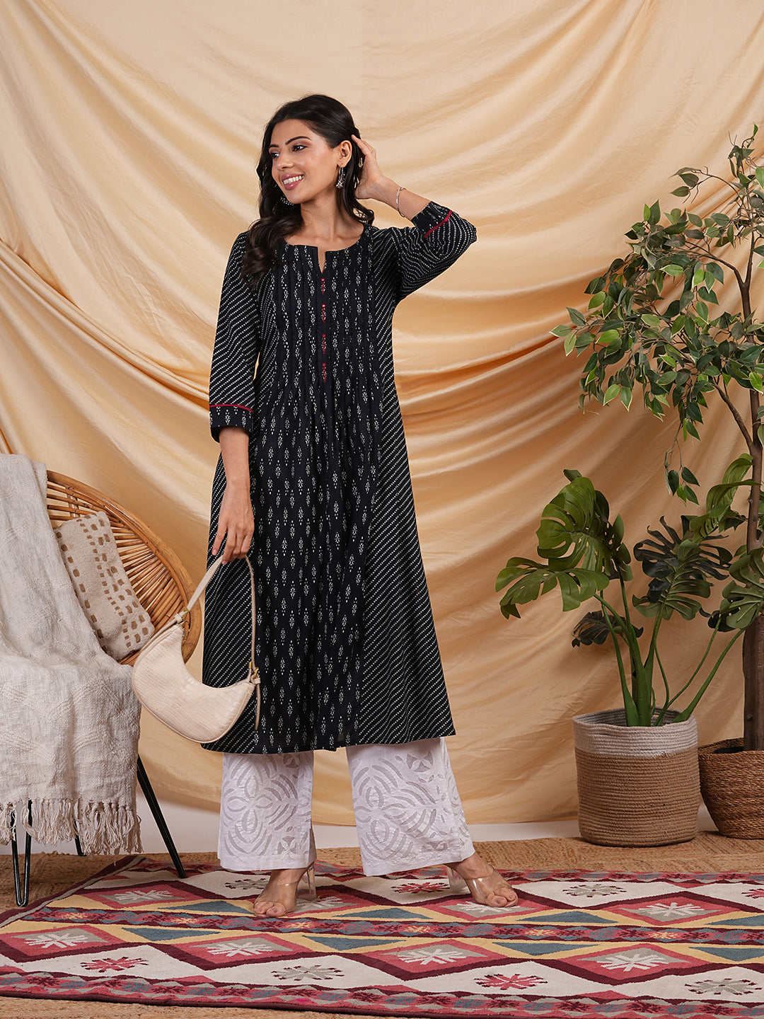 Flared Printed cotton kurta with a blend of two different prints with pleat & hand embroidery
