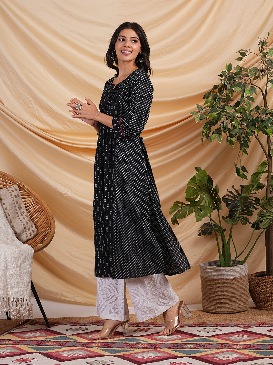 Flared Printed cotton kurta with a blend of two different prints with pleat & hand embroidery