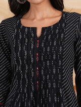 Flared Printed cotton kurta with a blend of two different prints with pleat & hand embroidery