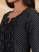 Flared Printed cotton kurta with a blend of two different prints with pleat & hand embroidery