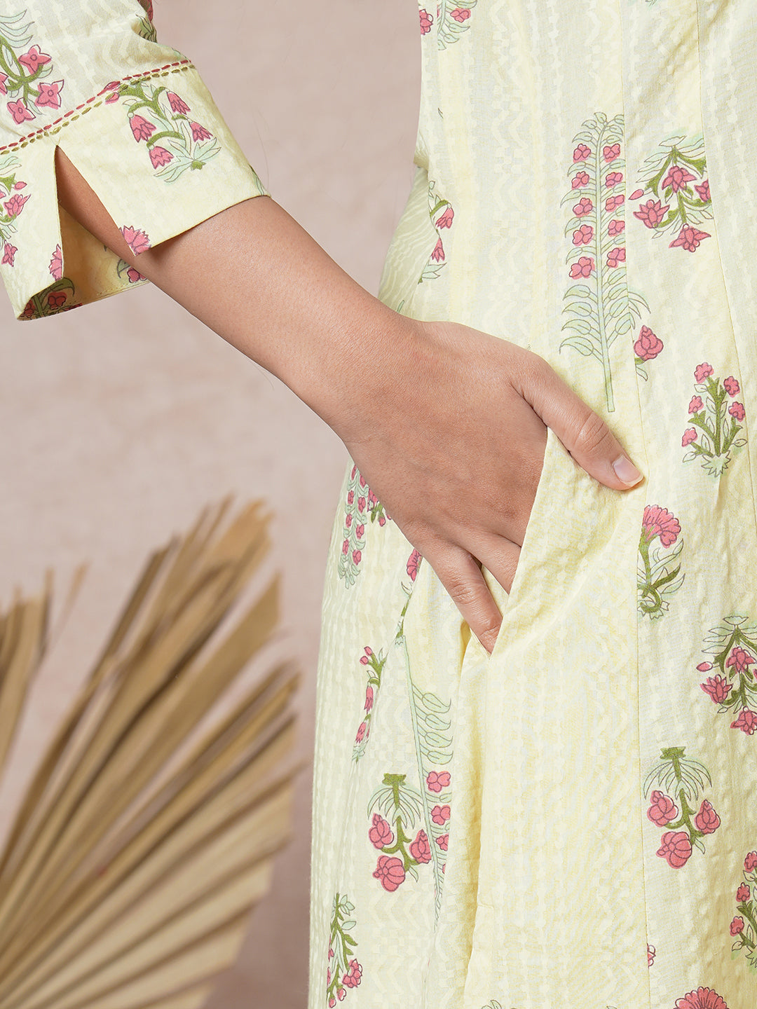 A-line cotton kurta with embroidered neckline and blend of two different prints