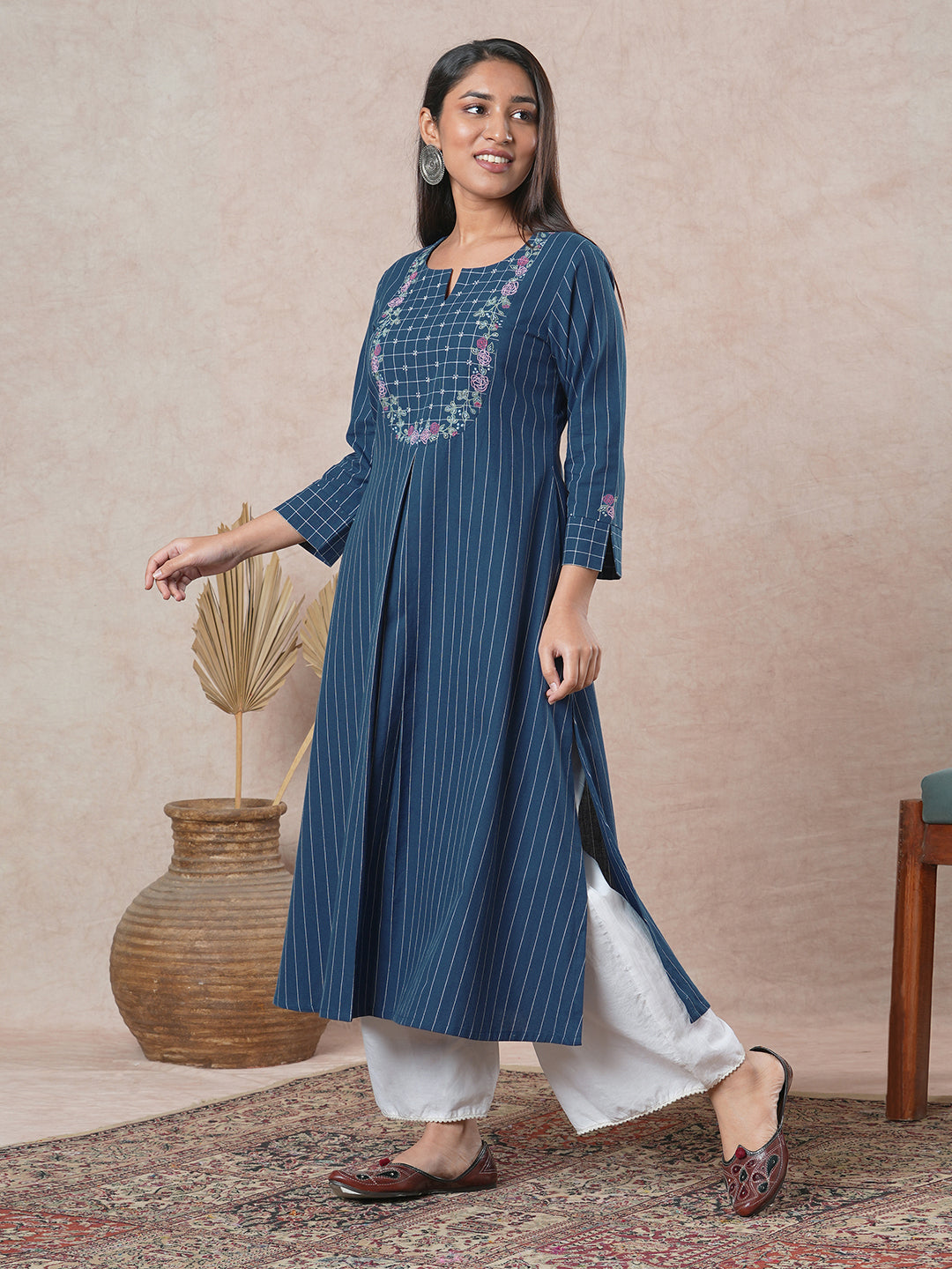 Embroidered A-line kurta with intricate beadwork and side pocket