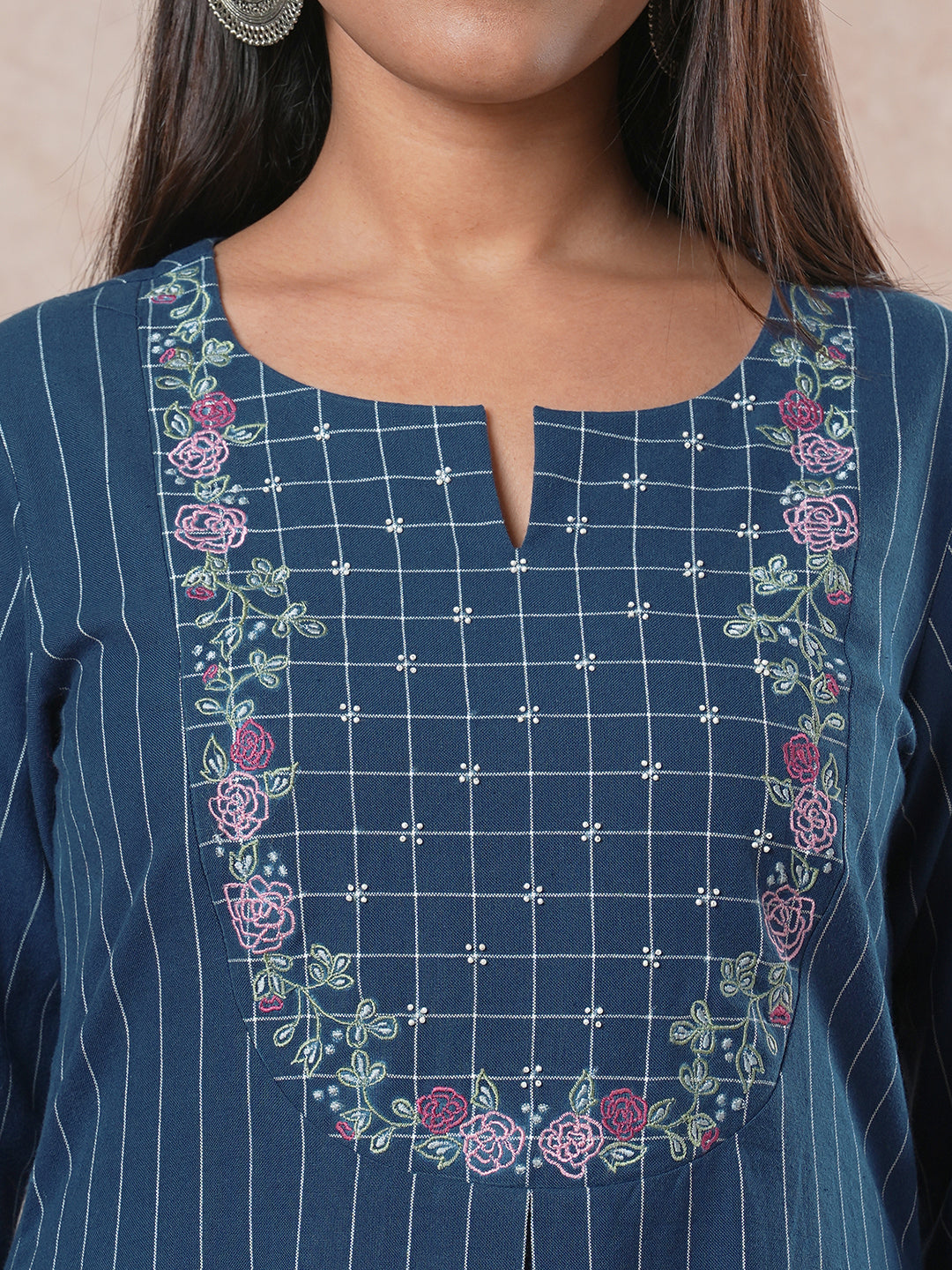 Embroidered A-line kurta with intricate beadwork and side pocket