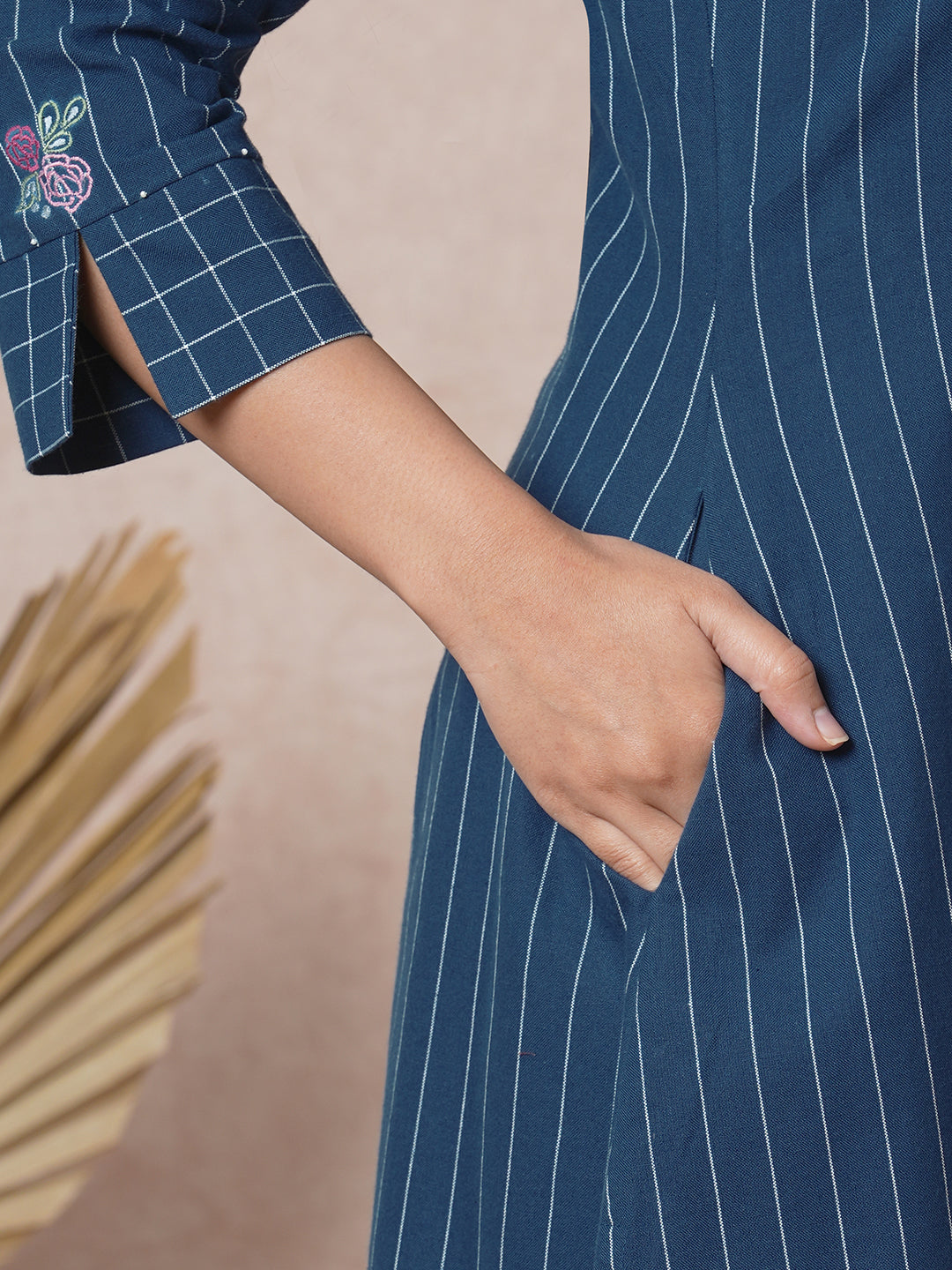 Embroidered A-line kurta with intricate beadwork and side pocket