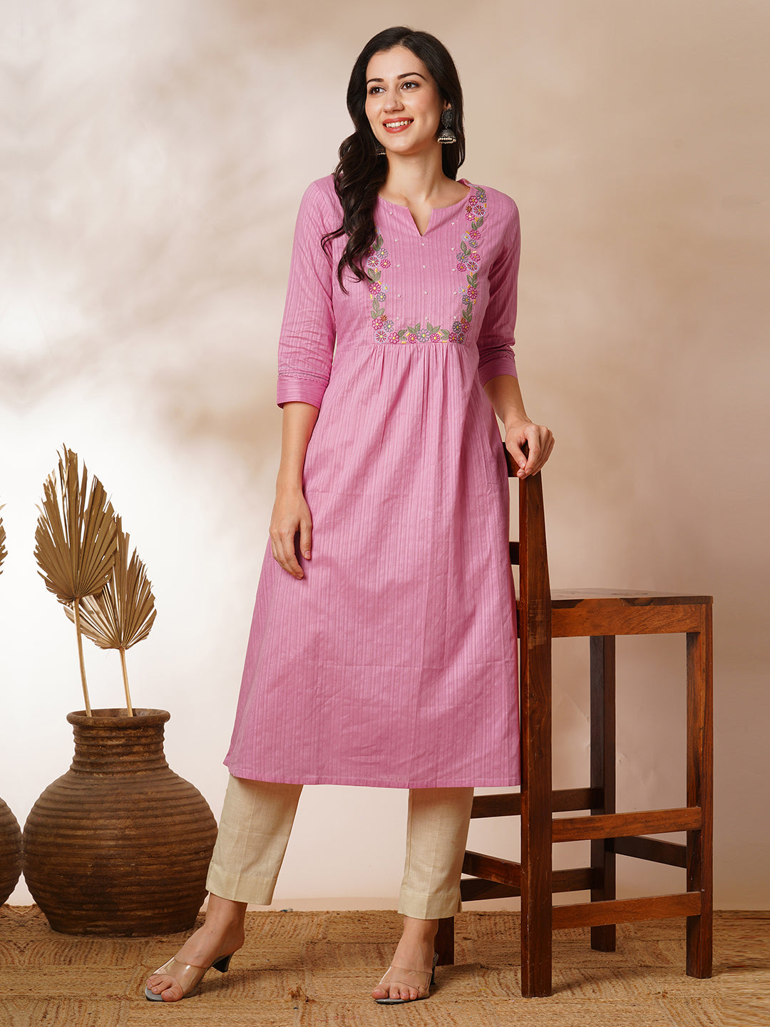 A-line kurta with beautifully embroidered yoke with beadwork detailing
