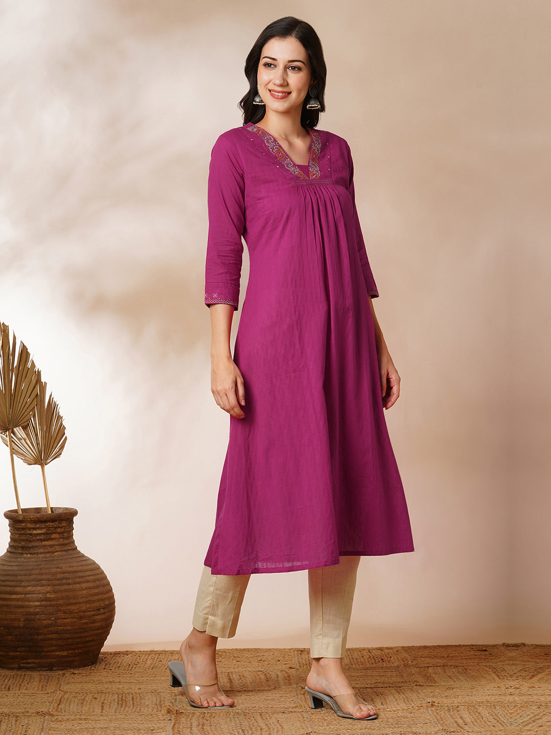 A-line woven cotton kurta with vibrant thread embroidery and gathering