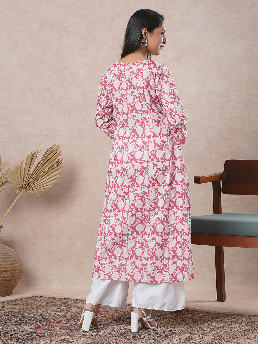 A-line cotton printed kurta with bead detailing around pleated V-neck and sleeve
