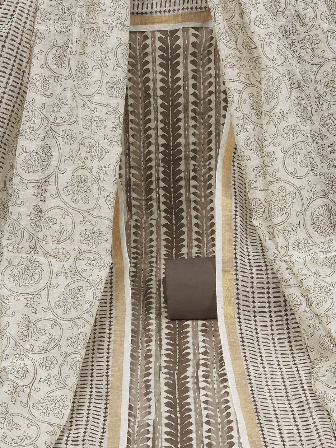 Brown unstitched suit set with traditional dabu print along with printed dupatta and solid bottom
