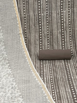 Brown unstitched suit set with traditional geometric dabu print along with printed dupatta and solid bottom