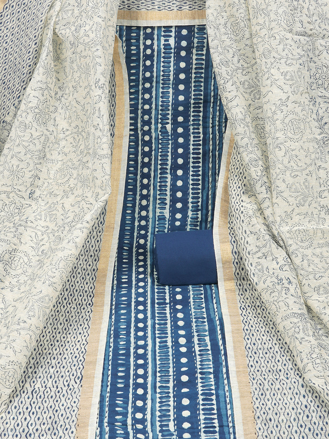 Blue unstitched suit set with traditional geometric dabu print along with printed dupatta and solid bottom