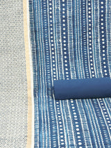 Blue unstitched suit set with traditional geometric dabu print along with printed dupatta and solid bottom
